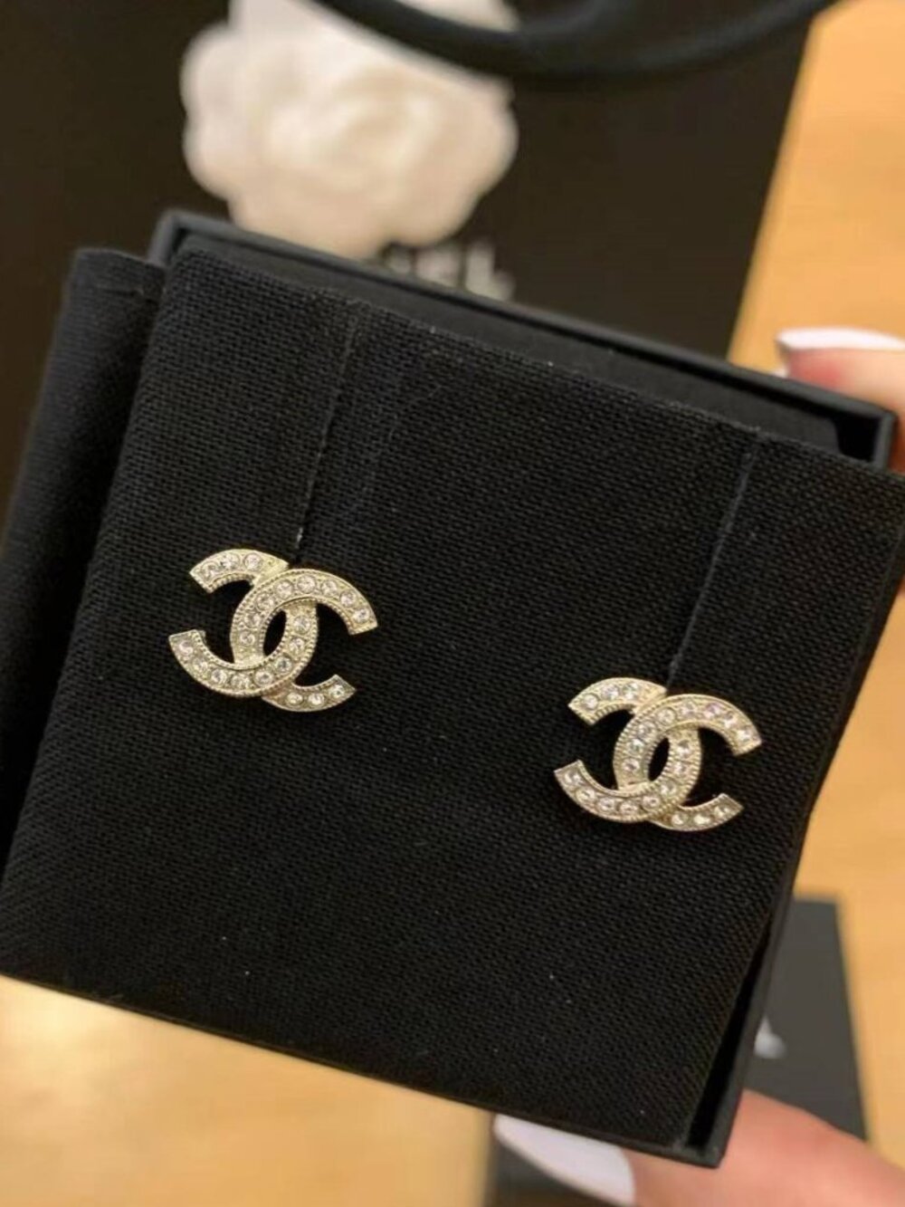 Authentic pre-owned Chanel earrings, featuring the double C logo